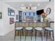 Modern bar area with seating, perfect for entertaining and relaxation at 201 Punta Vista Dr, St Pete Beach, FL 33706
