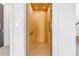 Interior view of a private residential elevator with a wood-paneled interior at 201 Punta Vista Dr, St Pete Beach, FL 33706