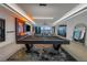Open-concept home featuring a pool table, living area, kitchen, and water views at 201 Punta Vista Dr, St Pete Beach, FL 33706