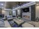 Relaxing living room boasts a modern fireplace, comfortable seating, and stylish decor at 201 Punta Vista Dr, St Pete Beach, FL 33706
