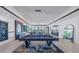 Open concept living room featuring a pool table and stunning water views at 201 Punta Vista Dr, St Pete Beach, FL 33706