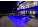 Gorgeous backyard featuring a luxurious pool, hot tub, and outdoor seating area at 201 Punta Vista Dr, St Pete Beach, FL 33706