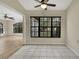 Eat-in kitchen with large window showcasing backyard views at 2224 Vista Royal Way, Spring Hill, FL 34606