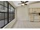 Eat-in kitchen with tile floor and a view of the backyard at 2224 Vista Royal Way, Spring Hill, FL 34606