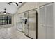Bright kitchen features stainless steel refrigerator and white appliances at 2224 Vista Royal Way, Spring Hill, FL 34606