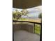 Balcony view with views of the waterfront and nearby palm trees adding to the appeal at 2413 Bayshore Blvd # 205, Tampa, FL 33629