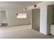 Open interior featuring a small opening to the kitchen and view of the doorway at 2413 Bayshore Blvd # 205, Tampa, FL 33629