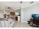 Comfortable living area featuring a modern fireplace, ceiling fan, and sleek design at 2713 Via Murano # 216, Clearwater, FL 33764