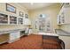 Bright office space featuring built-in shelving and a view; perfect for working from home at 2713 Via Murano # 216, Clearwater, FL 33764