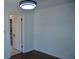 Bedroom features hardwood floors and a doorway to another room at 2721 12Th N St, St Petersburg, FL 33704