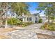 Charming exterior view of a single-story home with well-maintained landscaping at 2721 12Th N St, St Petersburg, FL 33704