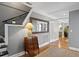 Elegant foyer with hardwood floors, decorative mirror, and staircase at 2721 12Th N St, St Petersburg, FL 33704