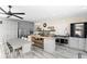 Modern kitchen with stainless steel appliances, kitchen island, and an open layout at 2721 12Th N St, St Petersburg, FL 33704