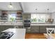 Well-lit kitchen with stainless steel appliances and ample counter space at 2721 12Th N St, St Petersburg, FL 33704