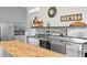 Chef's kitchen with stainless steel appliances, ample counter space, and a modern design at 2721 12Th N St, St Petersburg, FL 33704