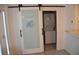 Washer and dryer are in the laundry area behind unique sliding pantry doors at 2721 12Th N St, St Petersburg, FL 33704