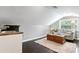 Attic living room with sink and view to a window at 2721 12Th N St, St Petersburg, FL 33704