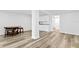 Open-concept living area boasts stylish wood-look floors and versatile space for dining and relaxation at 2721 12Th N St, St Petersburg, FL 33704