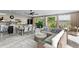 Expansive space with a seamless transition from kitchen and dining to comfortable lounge at 2721 12Th N St, St Petersburg, FL 33704