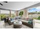 Inviting sunroom with ample seating, perfect for relaxing and entertaining at 2721 12Th N St, St Petersburg, FL 33704