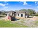 New home under construction, featuring modern roof lines and spacious layout at 31049 Eloian Dr, Wesley Chapel, FL 33545