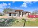 Image of home under construction showing a modern design, concrete blocks and new windows at 31049 Eloian Dr, Wesley Chapel, FL 33545