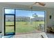 View from the screened lanai, overlooking the backyard at 32960 Regent Canal St, Wesley Chapel, FL 33545