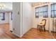 Bedroom with wood floors, a closet and lots of light at 36936 Kay Ave, Zephyrhills, FL 33542