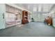 Spacious sun room features carpet and lots of windows at 36936 Kay Ave, Zephyrhills, FL 33542