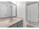 Clean bathroom with modern fixtures, a vanity, and a combined shower/tub, providing a functional and comfortable space at 406 W Azeele St # 103, Tampa, FL 33606
