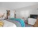 Bright bedroom offers ample space and storage with large closet for clothing and personal items at 406 W Azeele St # 103, Tampa, FL 33606