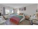 Inviting bedroom with bright window and charming decor, creating a cozy and personalized space for rest and relaxation at 406 W Azeele St # 103, Tampa, FL 33606