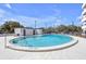 A lovely community pool is surrounded by clean white pavers at 406 W Azeele St # 103, Tampa, FL 33606