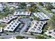Aerial view of the condo community, highlighting the central parking area and building arrangement at 4355 Tahitian Gardens Cir # D, Holiday, FL 34691
