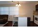Open dining area with island seating and large window with blinds at 4355 Tahitian Gardens Cir # D, Holiday, FL 34691
