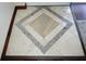 Elegant foyer showcasing decorative tiled flooring and rich wood trim at 4355 Tahitian Gardens Cir # D, Holiday, FL 34691