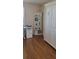 Office space with white furniture, and a bookcase providing ample storage solutions at 4355 Tahitian Gardens Cir # D, Holiday, FL 34691
