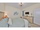 Bedroom featuring a bed with natural light, carpet floors, and a dresser at 4524 Deep Creek Ter, Parrish, FL 34219