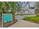 Community dog park featuring a grassy area, palm tree, and fenced entry at 4524 Deep Creek Ter, Parrish, FL 34219