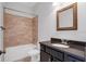 Bathroom featuring granite counters, undermount sink, tile flooring, tub and shower at 5943 Jasper Glen Dr, Lithia, FL 33547