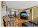 Spacious living room featuring a TV and seating, creating a cozy space for relaxation at 645 16Th S Ave, St Petersburg, FL 33701