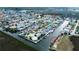 Aerial shot showcasing neighborhood along canals offering boat access to the water at 7034 Southwind Dr, Hudson, FL 34667