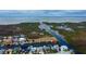 Vacant waterfront property featuring a private dock and serene bay access at 7034 Southwind Dr, Hudson, FL 34667