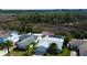 An aerial view of a beautiful home with a lush green surroundings at 7034 Southwind Dr, Hudson, FL 34667