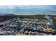 A coastal residential community features waterfront living, a serene bay, and canals at 7034 Southwind Dr, Hudson, FL 34667