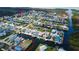 Aerial view of waterfront community showcasing canal access and nearby homes at 7034 Southwind Dr, Hudson, FL 34667