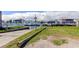 Community boat ramp featuring canal access and homes with backyard docks, promoting waterfront living at 7034 Southwind Dr, Hudson, FL 34667