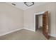 Bedroom featuring carpeted floor, neutral color walls, and view of a doorway at 709 W Azeele St, Tampa, FL 33606