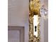 Close-up of a vintage doorknob with crystal handle and ornate golden plate at 709 W Azeele St, Tampa, FL 33606