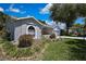 Charming single-story home featuring attractive landscaping and a well-maintained lawn at 8045 Sugarbush Dr, Spring Hill, FL 34606